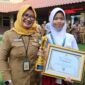 Alikha Hibatillah Jaelani meraih penghargaan dalam ajang Anak Indonesia Award 2026 dalam kategori Bahasa dan Budaya di Halaman Pusat Pemerintahan Kota Tangerang, Foto: ist